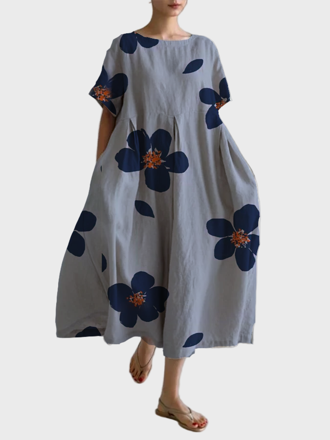 Graues Kleid mit blauen Blüten