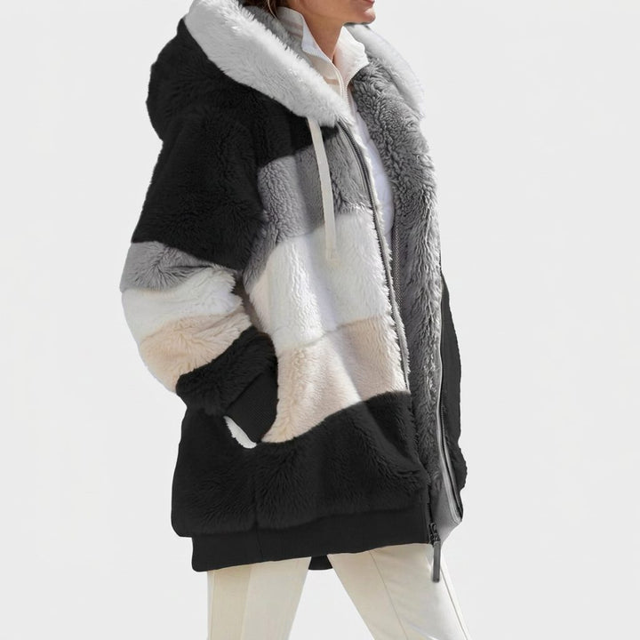 Vevina | Gefütterte Steppjacke mit Kapuze und Kunstfellbesatz für Damen
